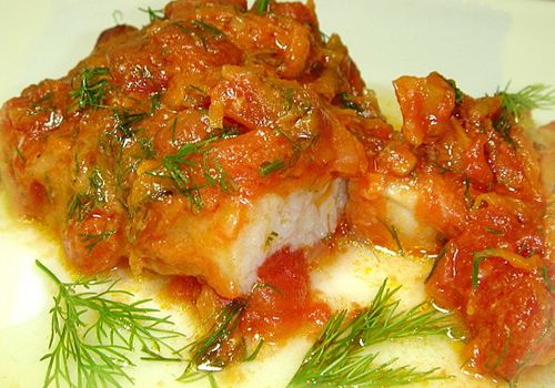Рецепт - Тушеная рыба с помидорами